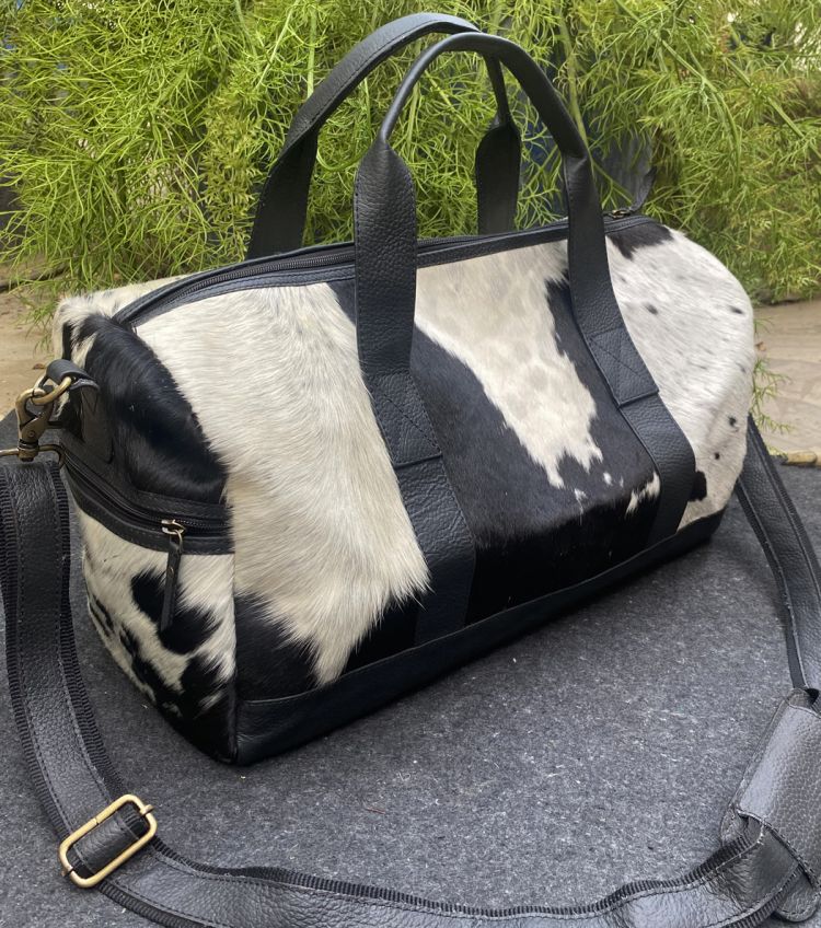 Klassy Cowgirl White and Black hair on cowhide overnighter Duffle Bag