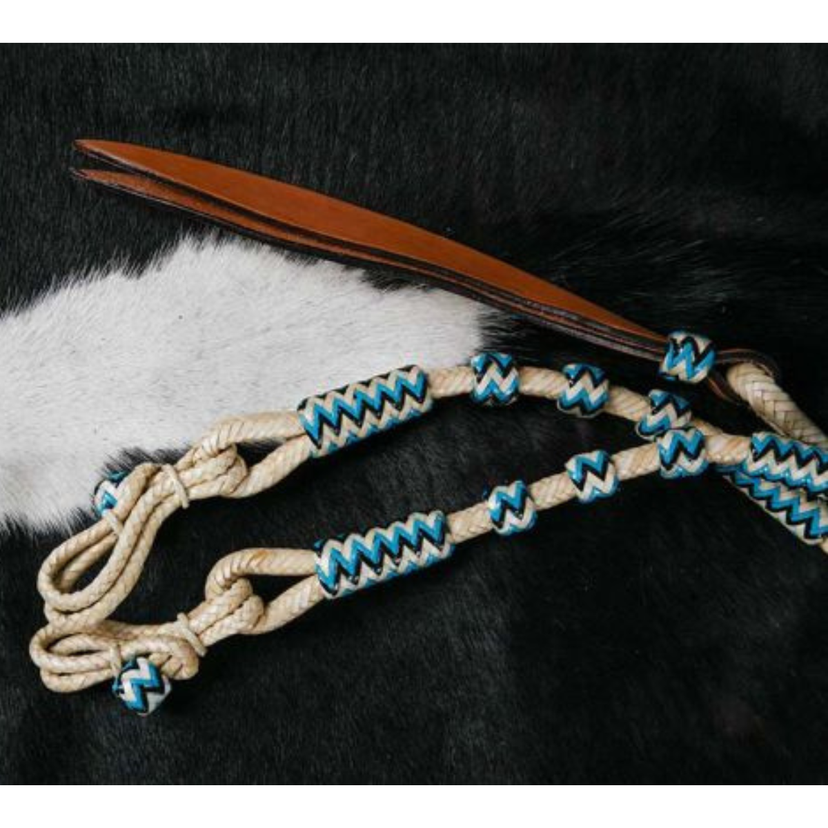 Showman ® Braided Natural Rawhide Romal Reins with Leather Popper and Blue Rawhide Beads. - Double T Saddles