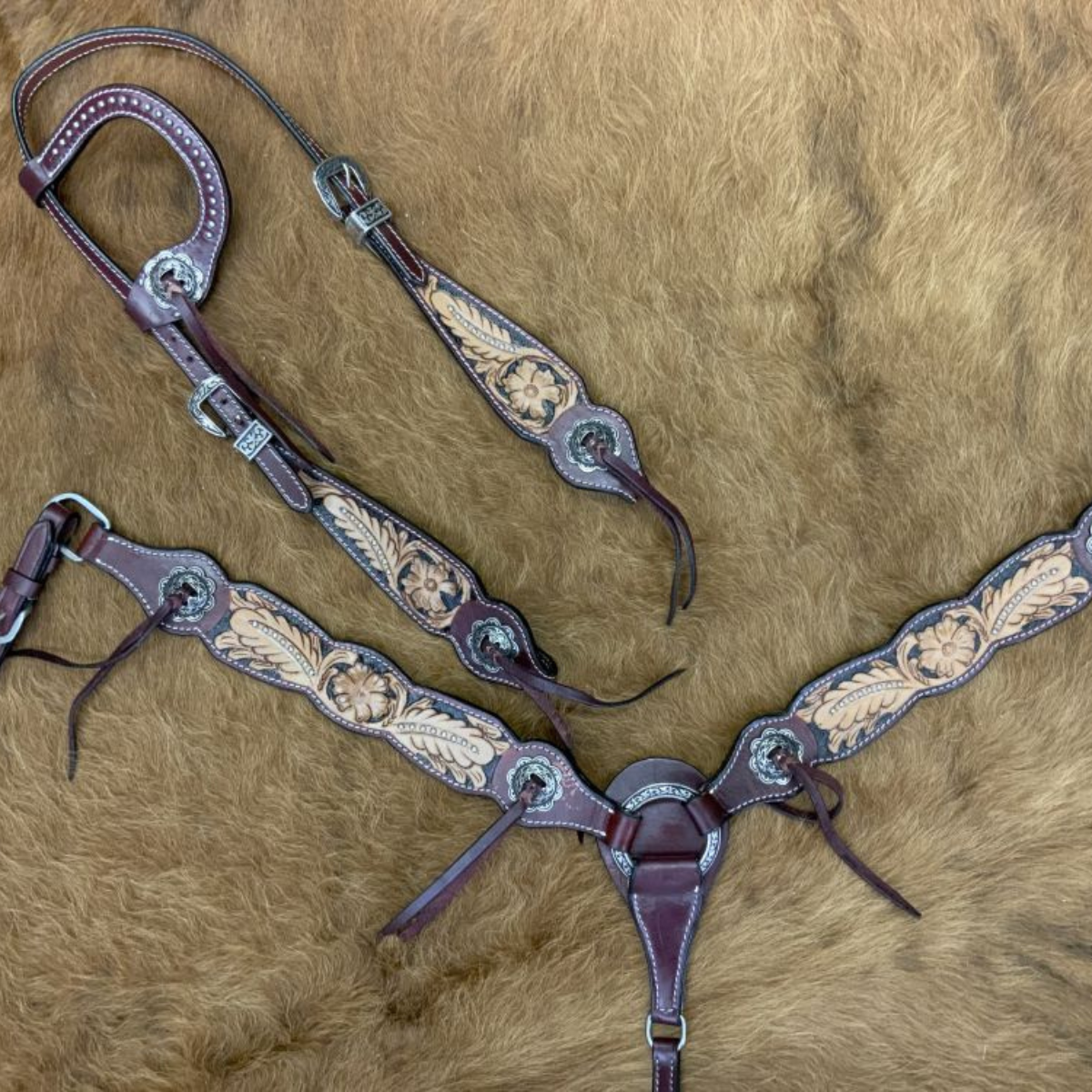 Showman ® Floral tooled design one ear bridle and breast collar set with silver beading and cowboy tie accents. - Double T Saddles