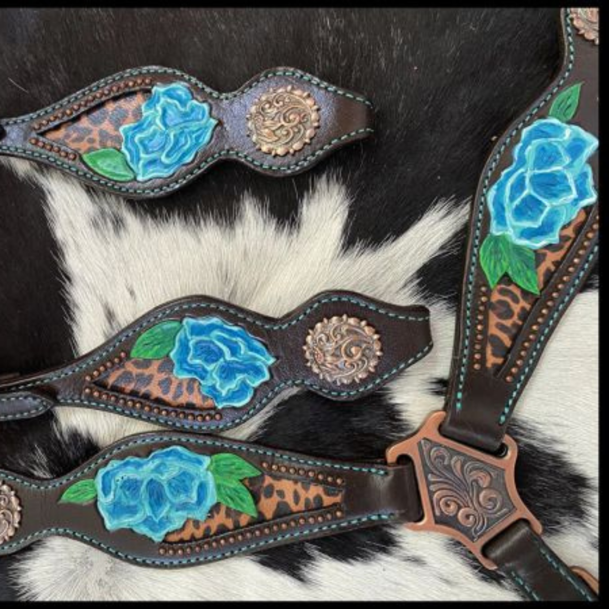 Showman ® Cheetah print inlay with painted blue flower accent one ear headstall and breast collar set. - Double T Saddles