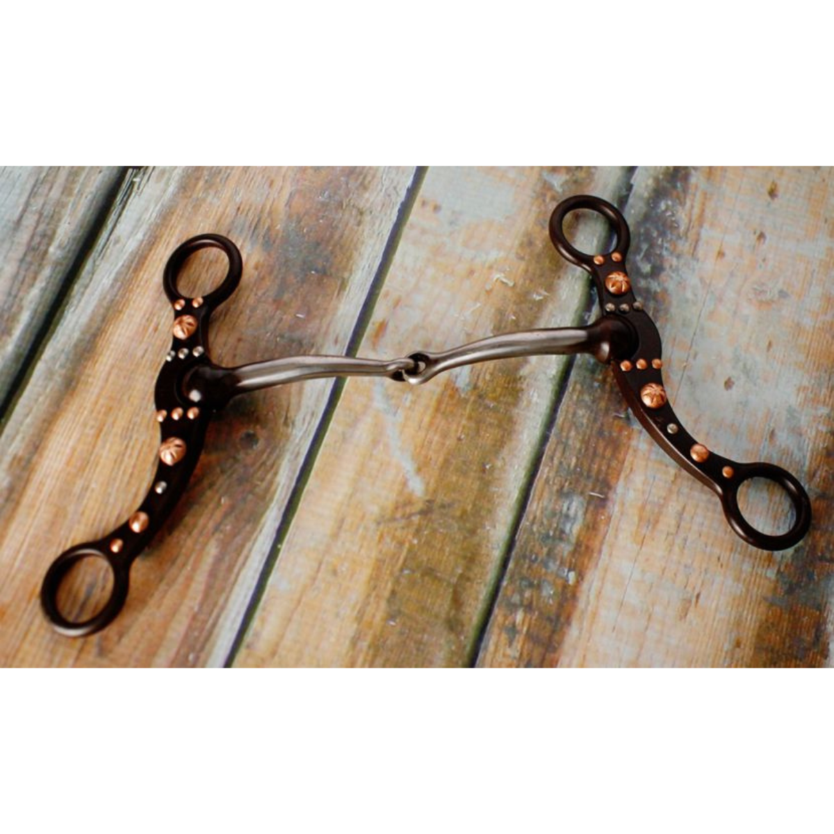 Showman ® brown steel snaffle bit with engraved copper studs and silver accents on the cheeks. - Double T Saddles