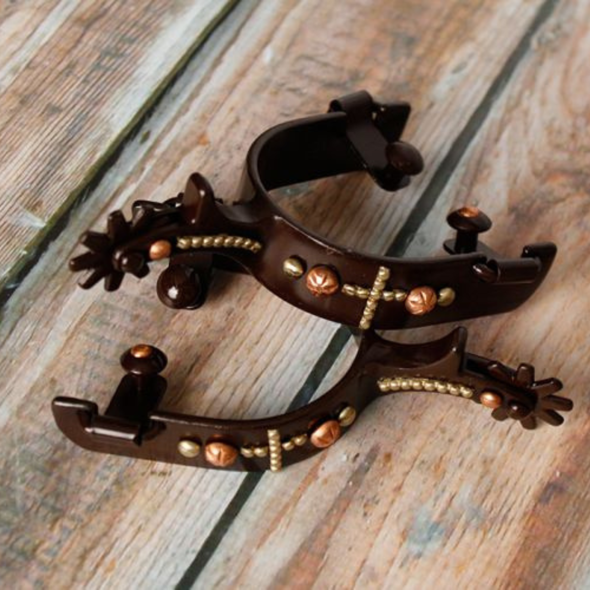 Showman ® brown steel spur with copper studded cross and engraved copper and gold studs. - Double T Saddles
