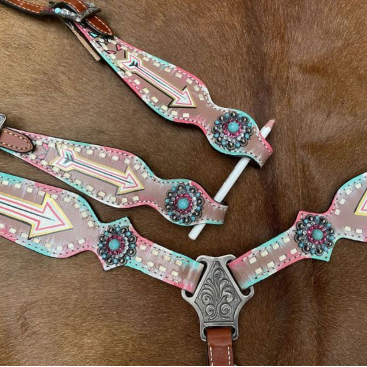 Showman ® Turquoise and pink inlay painted arrow design one ear headstall and breast collar set with matching accent conchos. - Double T Saddles